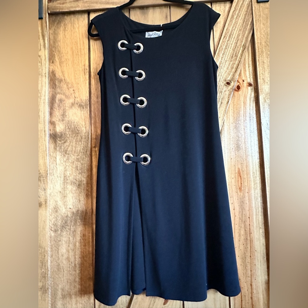 Joseph Ribkoff Black Dress with Silver Grommet Detail.  Size 12.  19” PTP 38” L